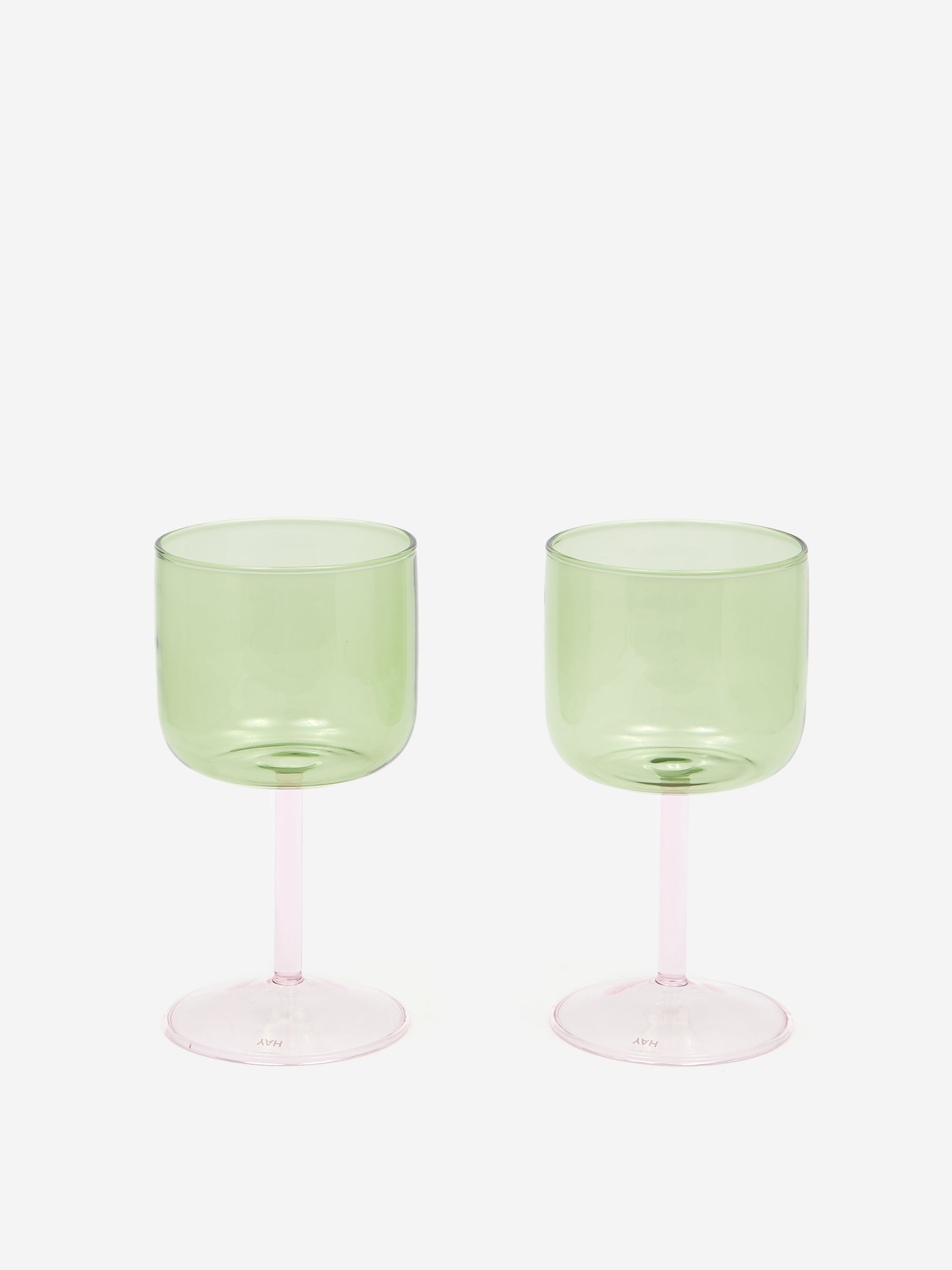 http://goodhoodstore.com/cdn/shop/files/HAY-TINT-WINE-GLASS-SET-OF-2---GREEN-AND-PINK_AW23_GOODHOOD_-1_2039f2a7-0c38-4cea-a3c5-ba9390f24aba.jpg?v=1694537873