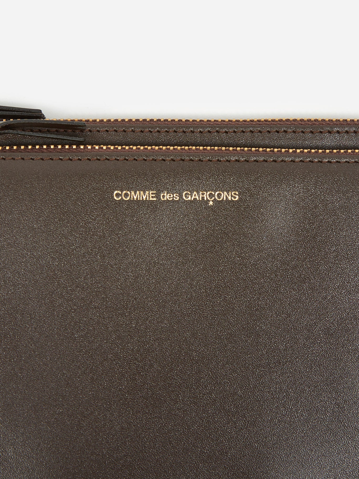 comme des garçons outside pocket half zip wallet